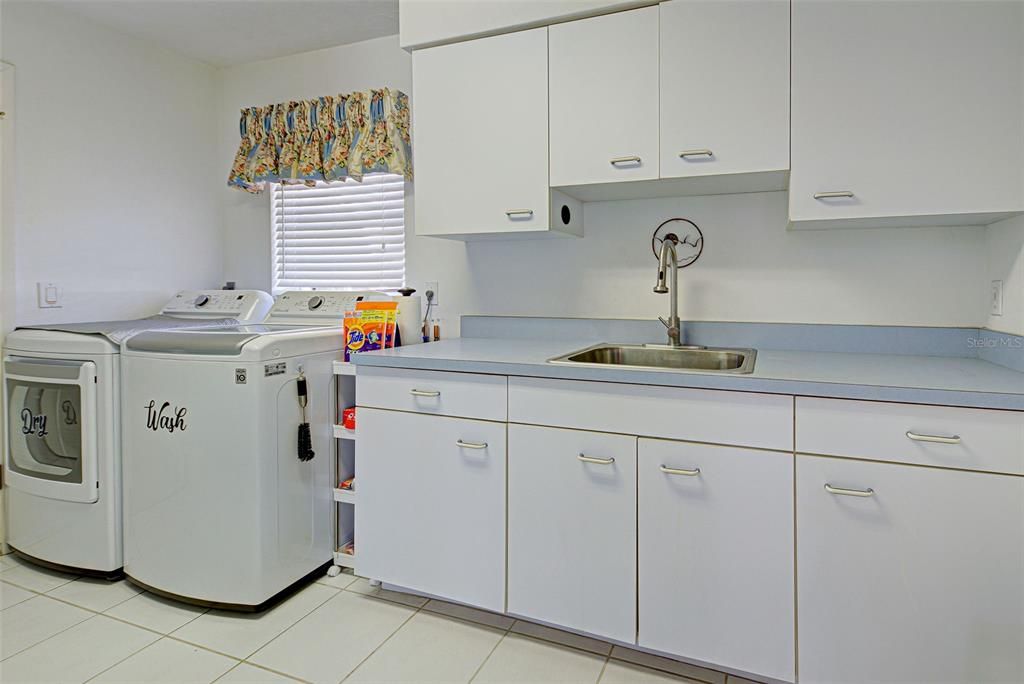 Laundry room with plenty of extra storage space