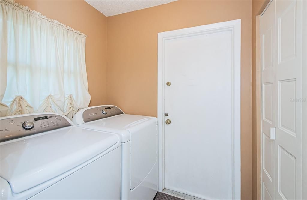 Inside Laundry Room with Closet