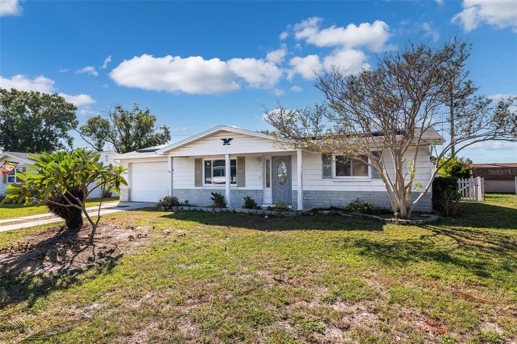 A lovely covered front porch welcomes you home!