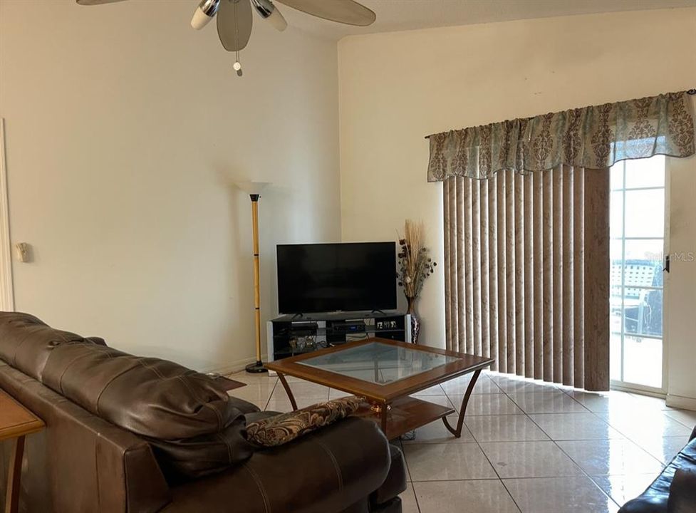 spacious family room with vaulted ceilings