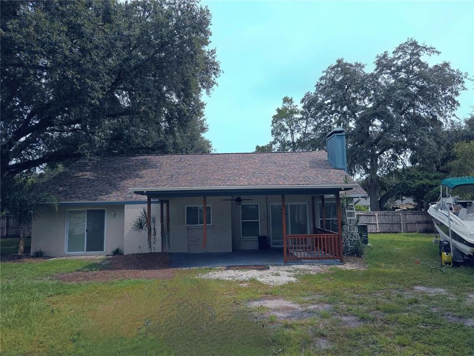 Rear view of house (boat is leaving soon)