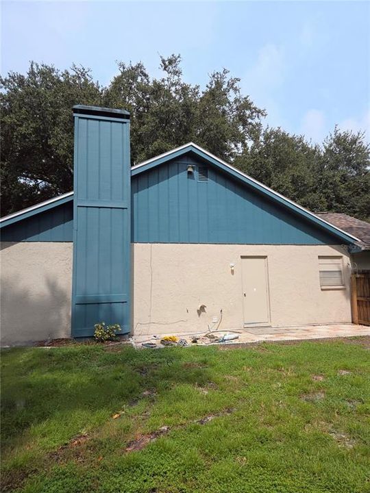 Left side yard with side entry to garage. Room to park a boat, camper, etc.