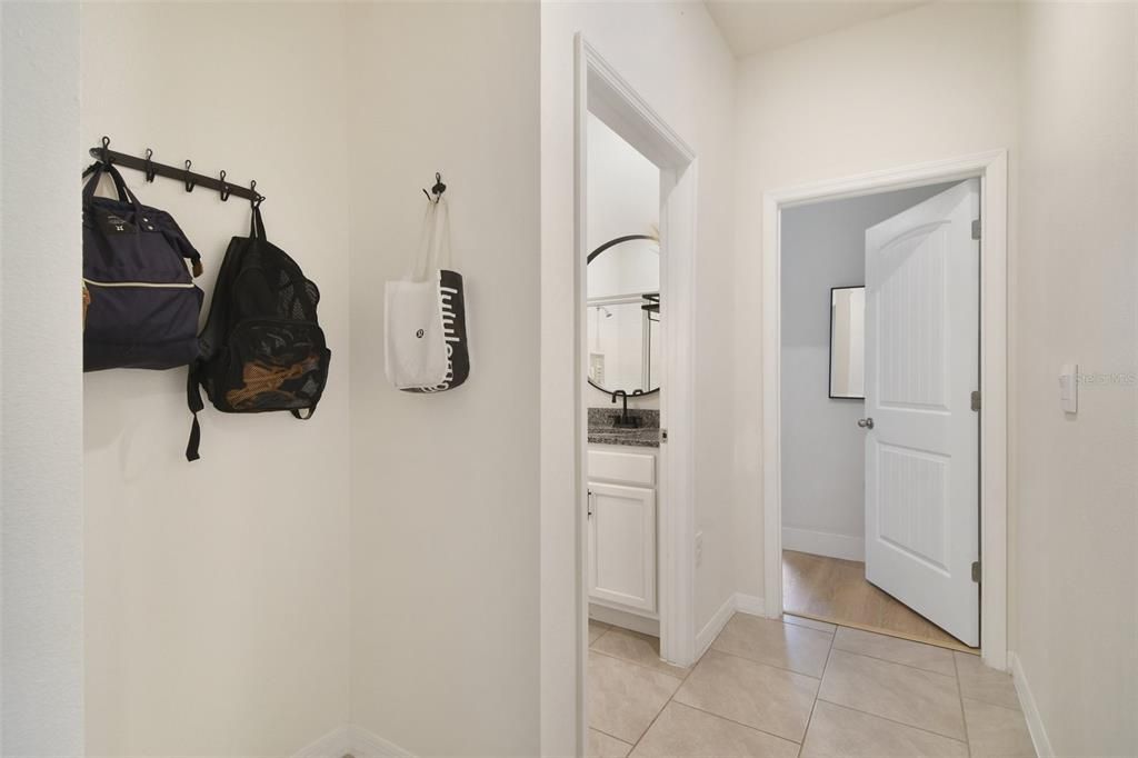 hallway to bathroom, bedroom 3 and garage