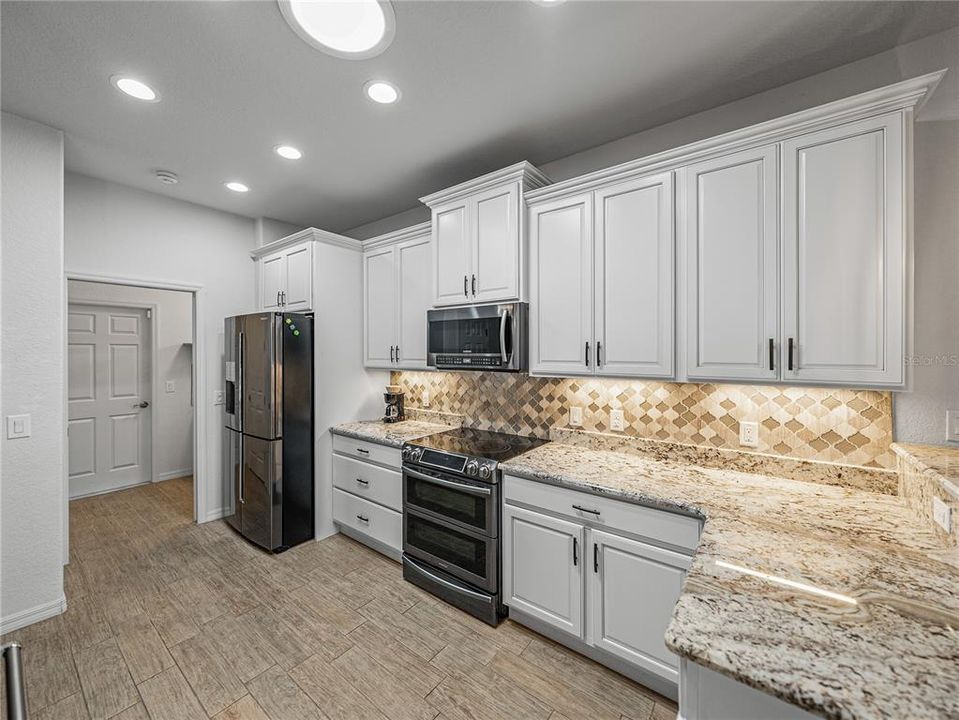 Beautiful backsplash with under cabinet lighting