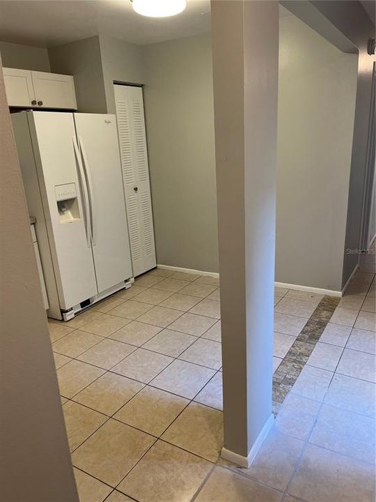 View of Open Hallway off Kitchen leading to Hall Bath and additional 2 bedrooms