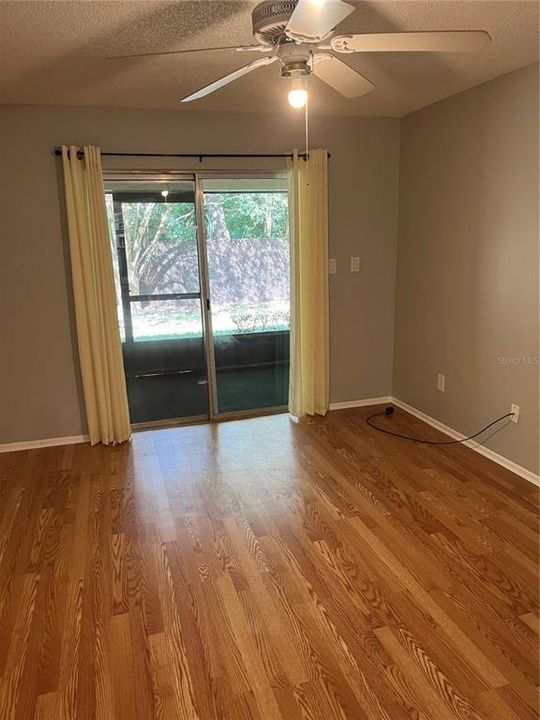 Primary Bedroom access to Rear Screened Porch