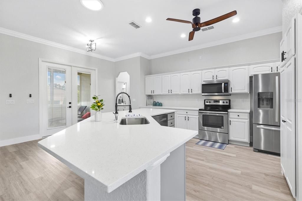 Quartz Countertops in Kitchen w/matching Backsplash