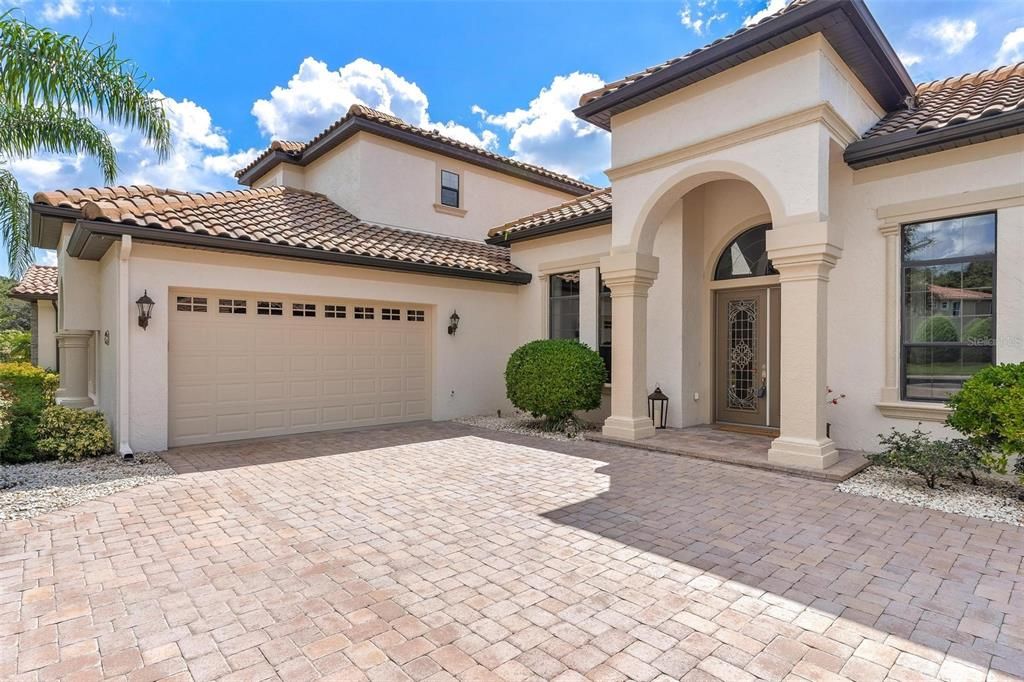 Oversized Two Car Garage and Brick Pavered Driveway