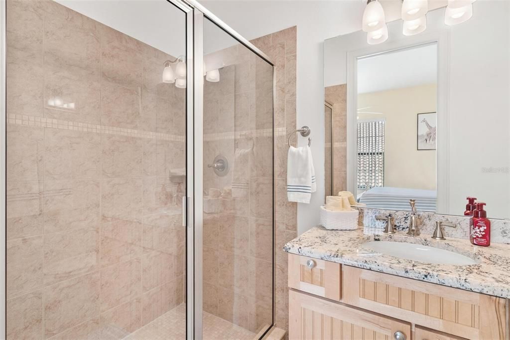 Guest Bathroom with Walk-in Tile Shower