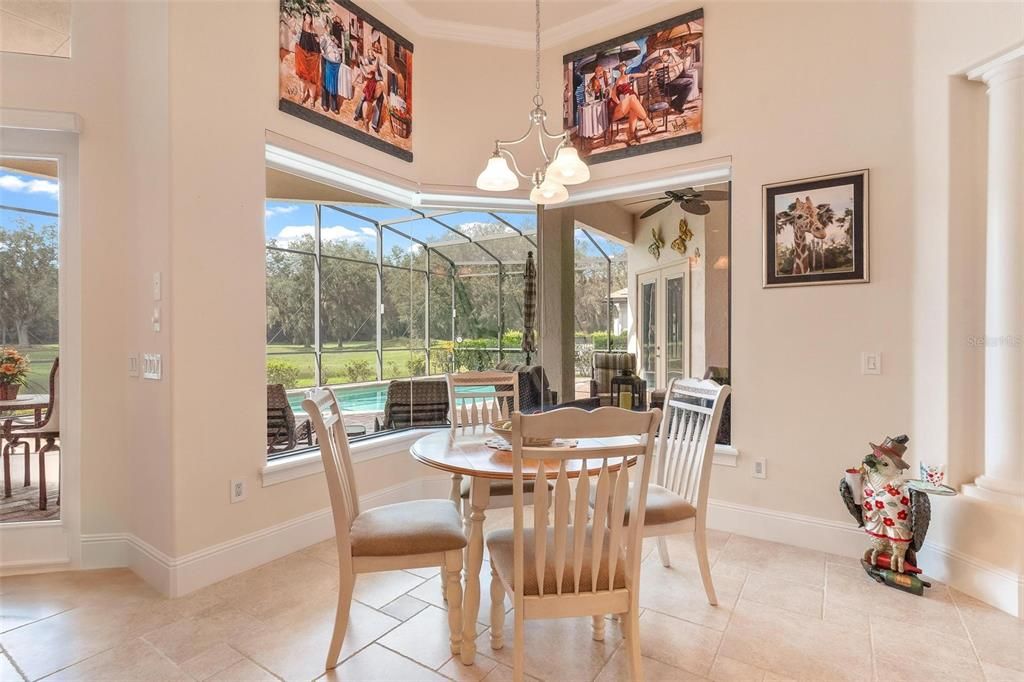 Dinette Area with Bay Windows overlooking Lanai and Pool Area