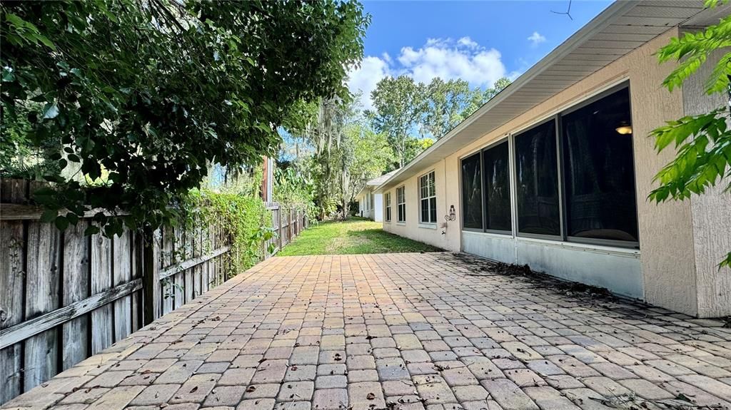 Wrap around brick paver deck