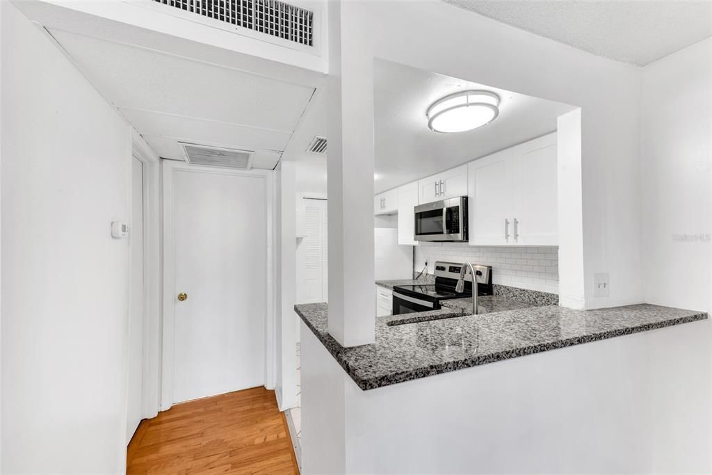 Breakfast bar can fit 2 stools comfortably.