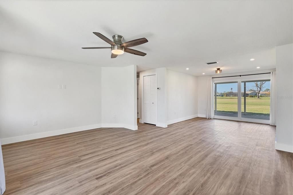 Newly installed LVT flooring creates smooth transitions between rooms.