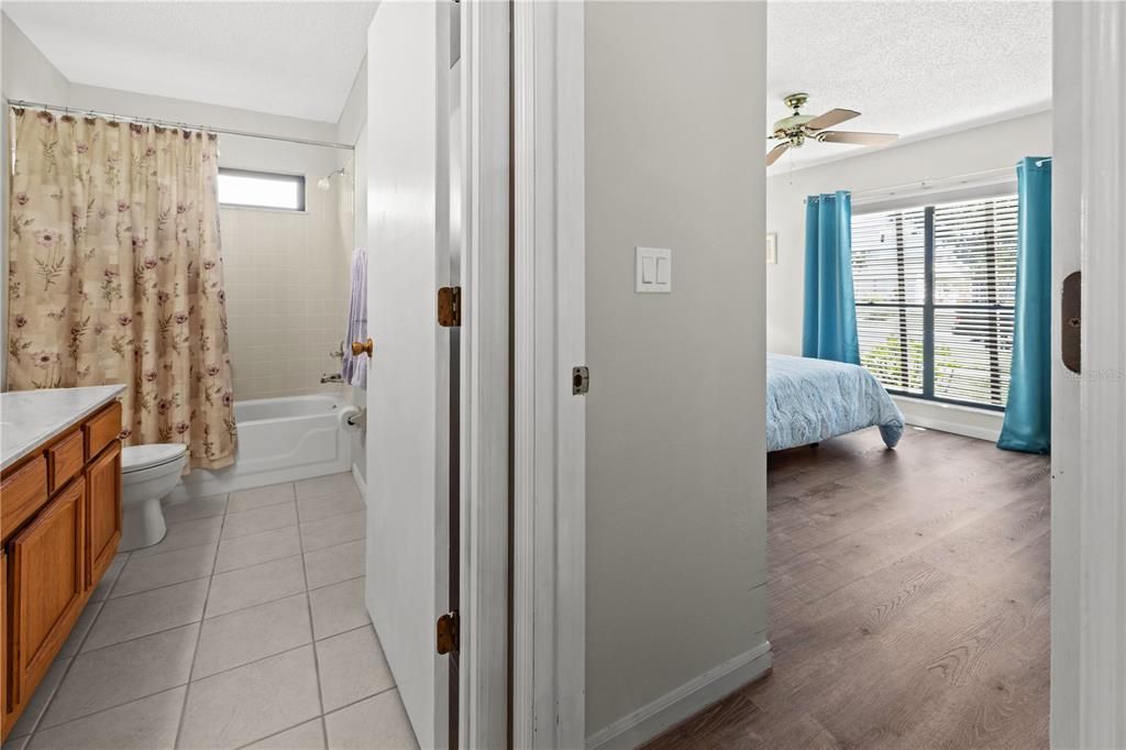 BEDROOM 2 IS THE DOOR TO THE RIGHT WITH THE MAIN BATHROOM ON THE LEFT. THIS SPACE HAS A LINEN CLOSET TOO.