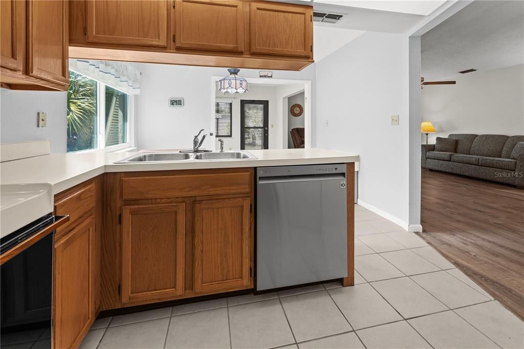 THE KITCHEN OVER LOOKS A DINETTE AREA.