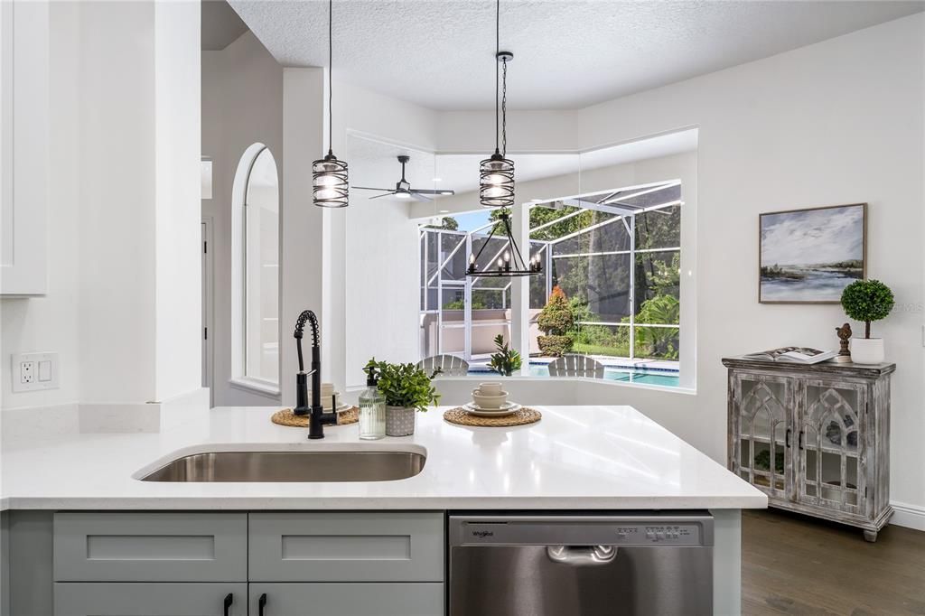 Kitchen Overlooks Dinette with Expansive Water Views