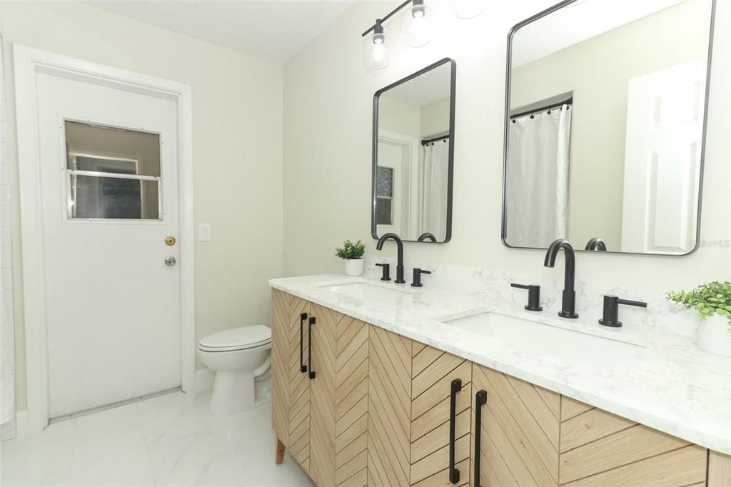 2nd bathroom with Double Vanity.  Shower/Tub