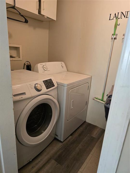 Indoor laundry off bonus room. Laminate flooring and storage.