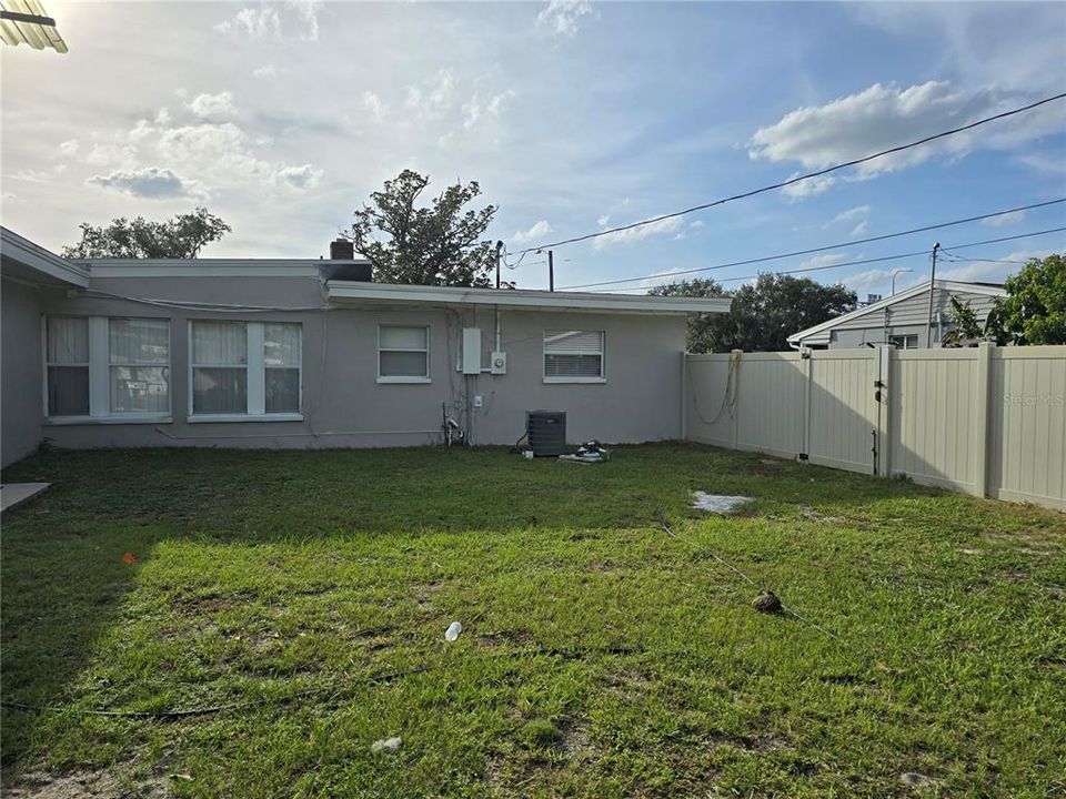 Backyard with gate access to private courtyard for studio apartment.