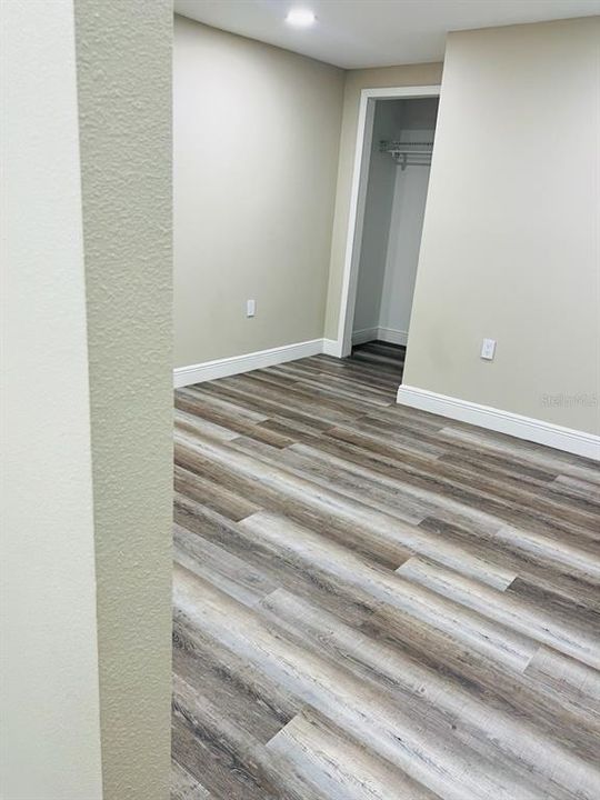 Feb. 2024 Studio apartment -bedroom laminate flooring.