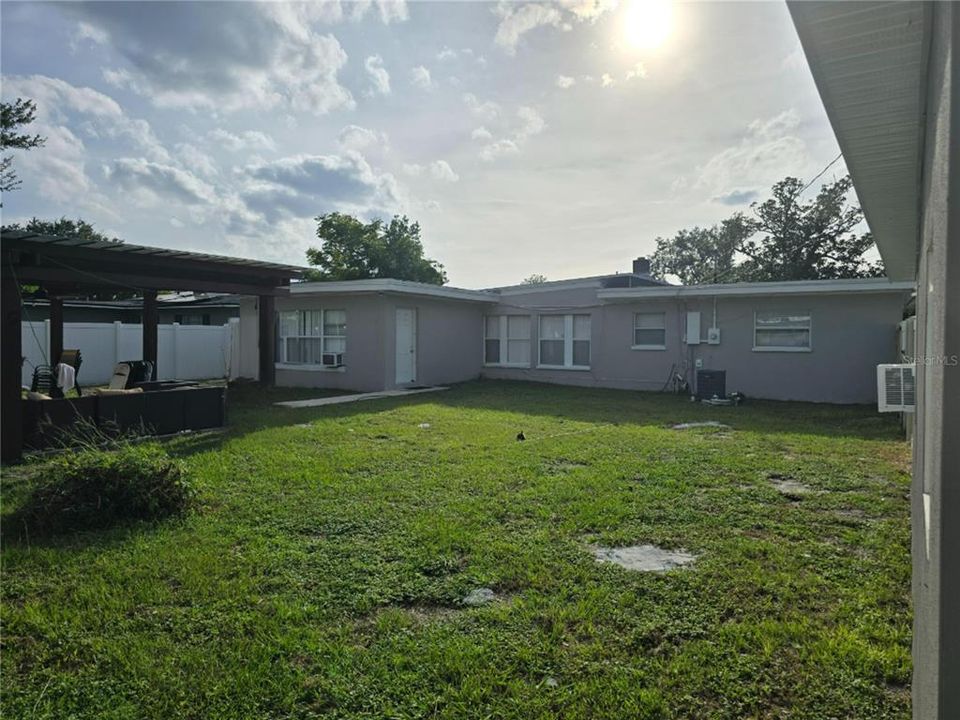 Spacious and private, fenced backyard.