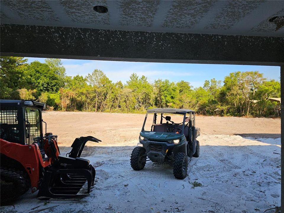 View of Expansive and Impressive 165'x217' BackYard from the 18'X10' Covered Pporch