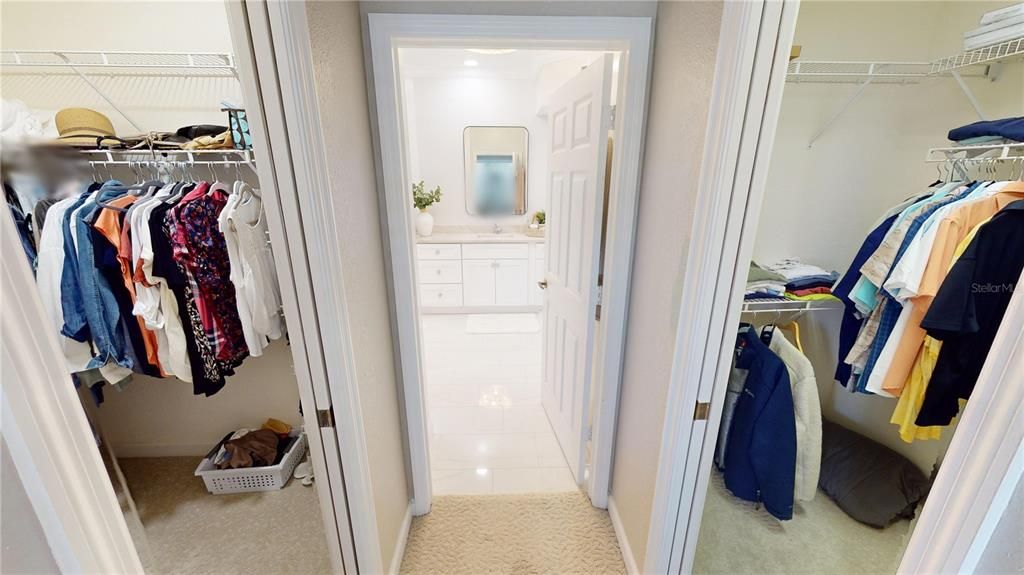 Primary ensuite bedroom. Dual walk-in closets