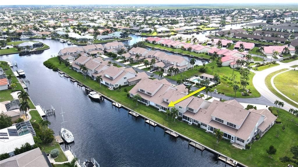 Aerial view of community waterfront and dockage