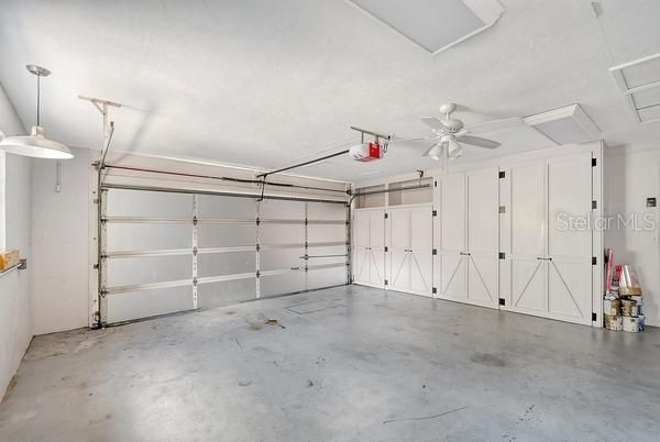 Finished garage floors and great cabinetry