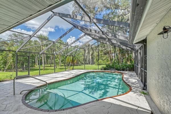 Enjoy the pastoral view beyond the pool!