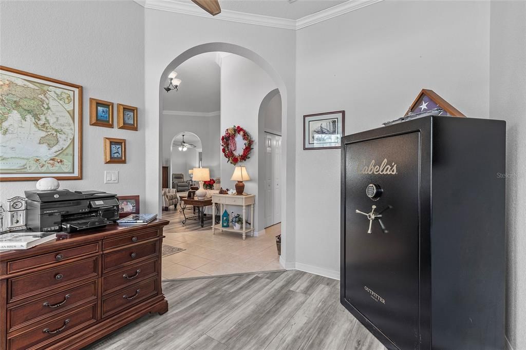 Den to right of foyer with Luxury vinyl plank flooring, crown molding, could easily be converted to a 3rd bedroom