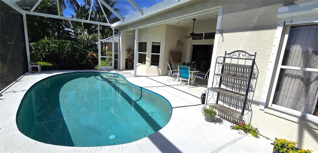 Screened waterfront pool enclosure