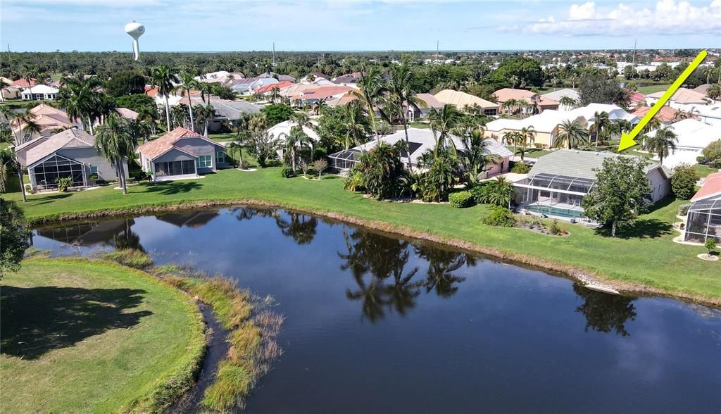 Rear aerial view of home and location