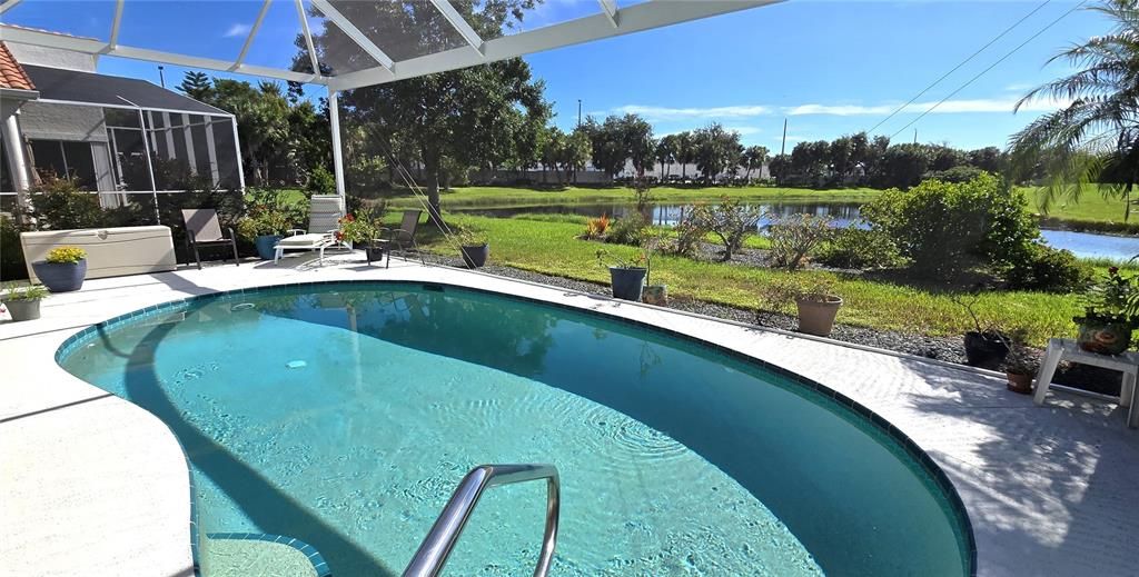 Screened waterfront pool enclosure