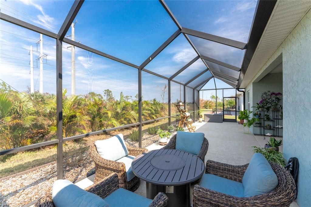 Extended screened Lanai stretches the entire rear of the house