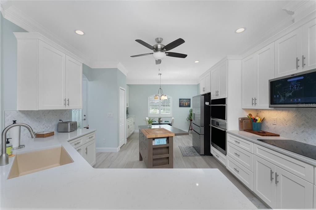 Kitchen has upgraded Quartz counter tops and composite sink