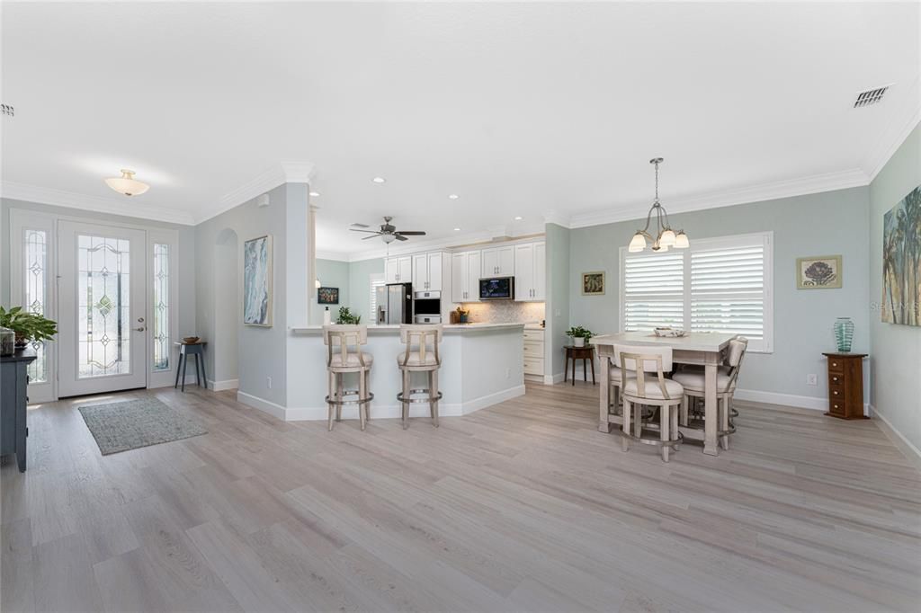 Open floor plan with Luxury Vinyl Plank flooring throughout