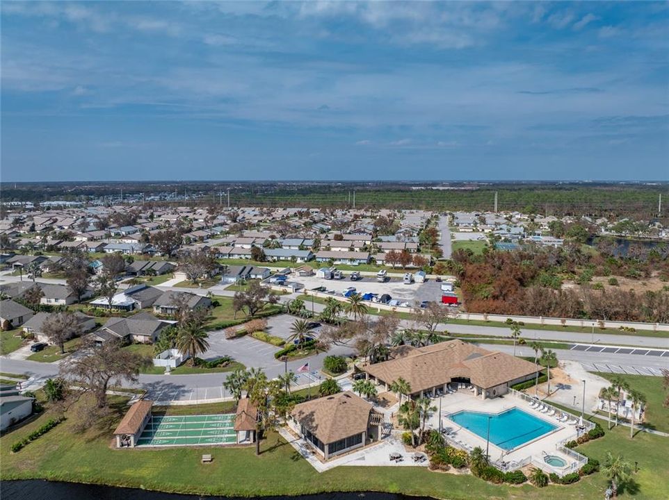 Community amenities include tennis/pickleball courts, shuffleboard, swimming pool and spa