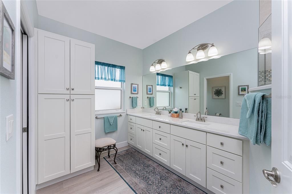 Additional storage closet in the primary bathroom