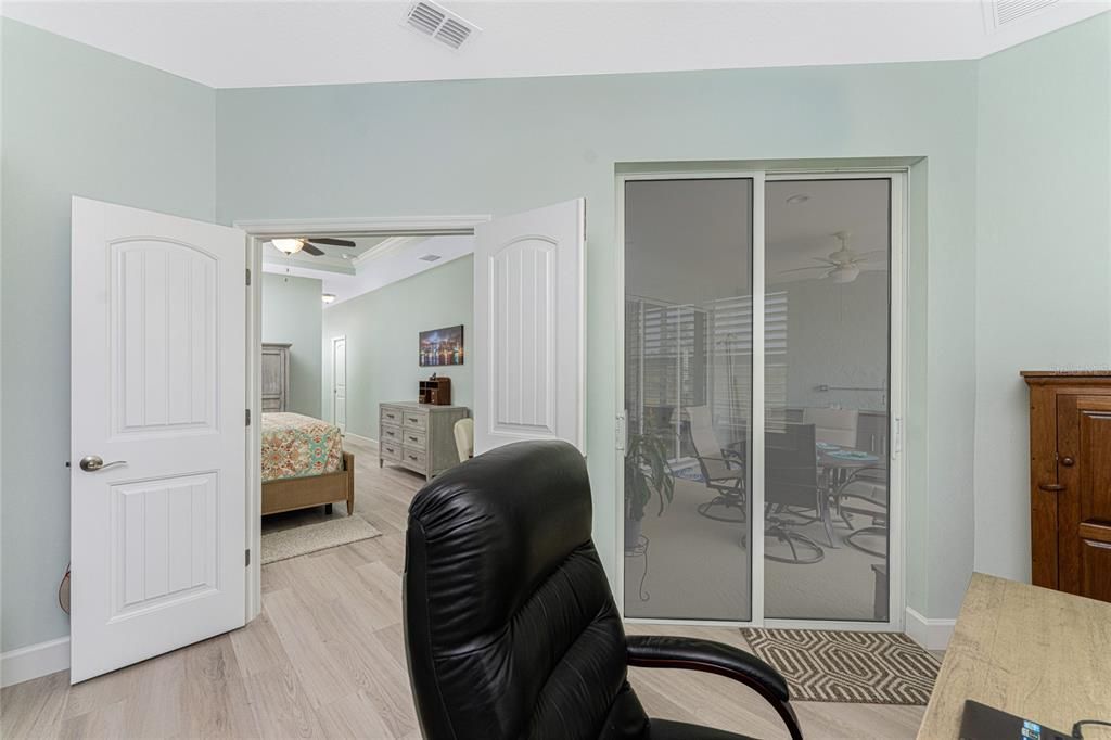 Bonus room is accessible from the primary bedroom and has sliding glass doors leading to the Lanai