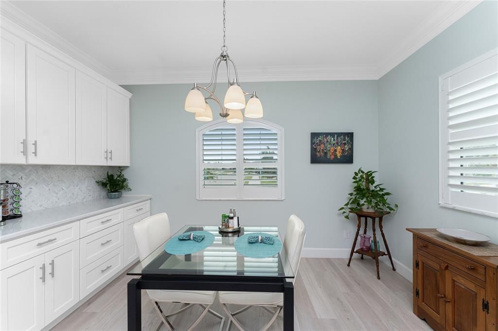 Plantation shutters throughout this home complete the coastal look