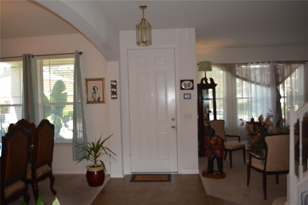 Entry into the house with tall door for a grand entrance