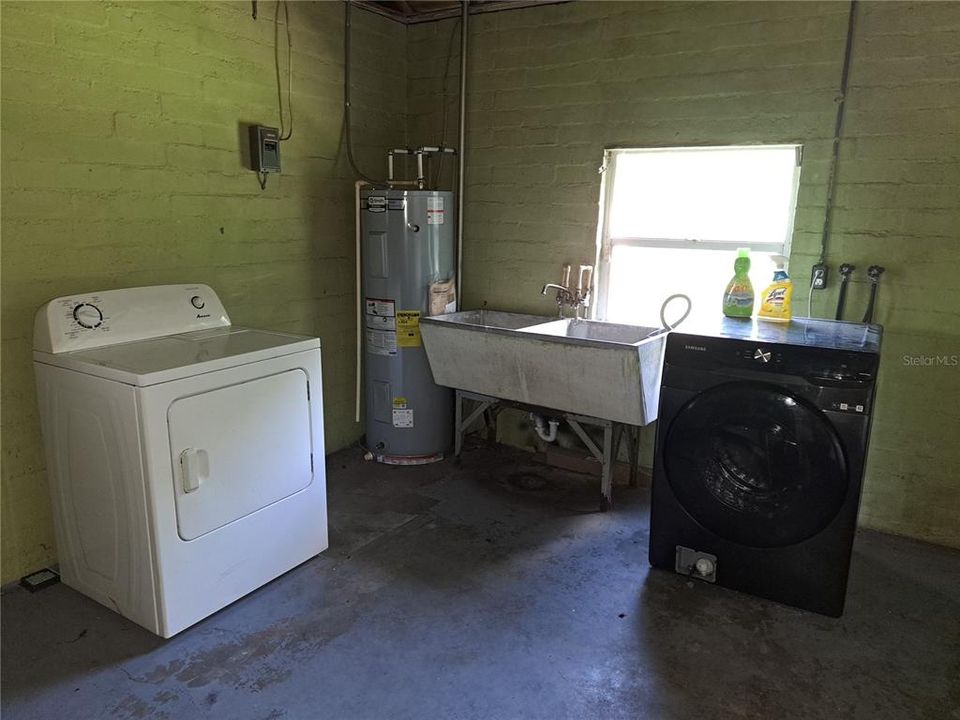 Laundry Area in Attached Garage.