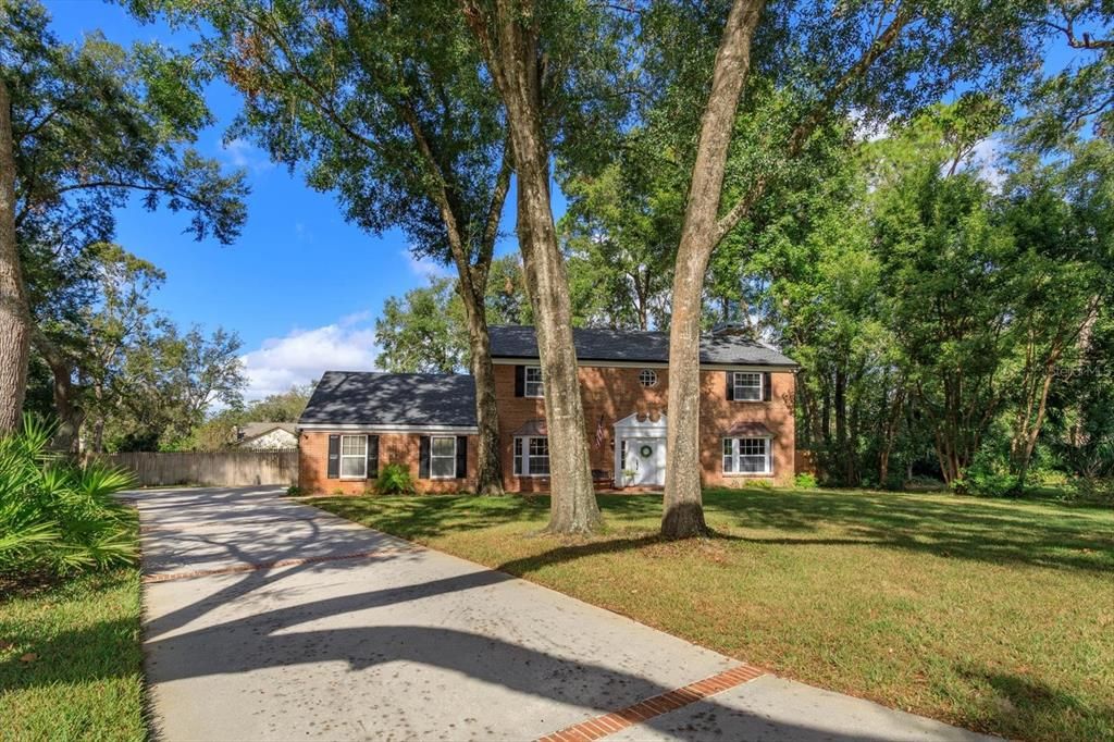 Oversized side entry 2 car garage with long driveway for extra parking