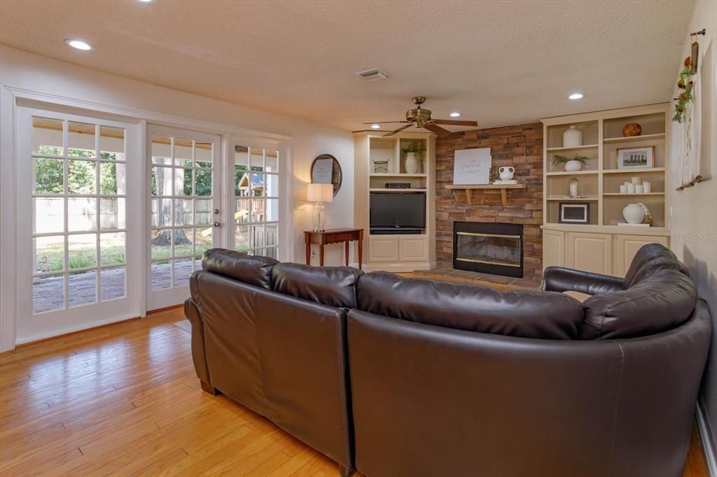 French doors and built in entertainment center