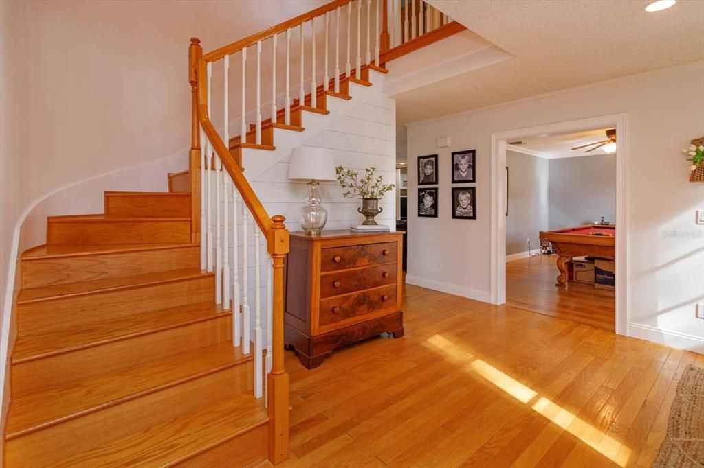 Wood floors and spindles on the staircase