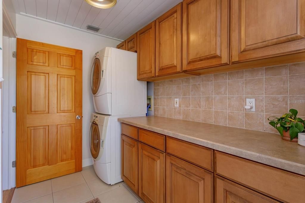 Downstairs laundry room with washer and dryer included