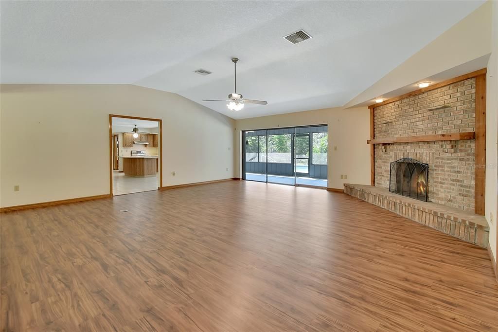 Living Room with openings to kitchen/casual dining