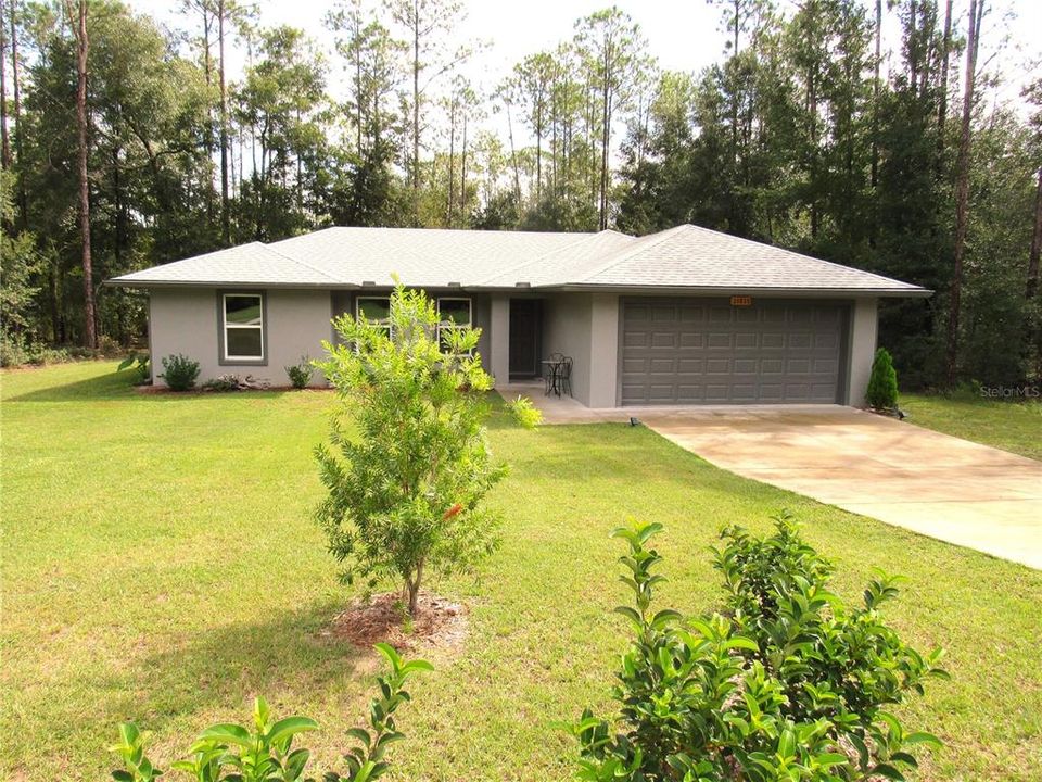 A Private & Serene Setting In The Woodlands of Rainbow Springs--Enjoy All of the Amenities Such as The Rainbow Springs Community Center & The Residents Private Park & Beach Right On The Historic-World Famous Rainbow River!