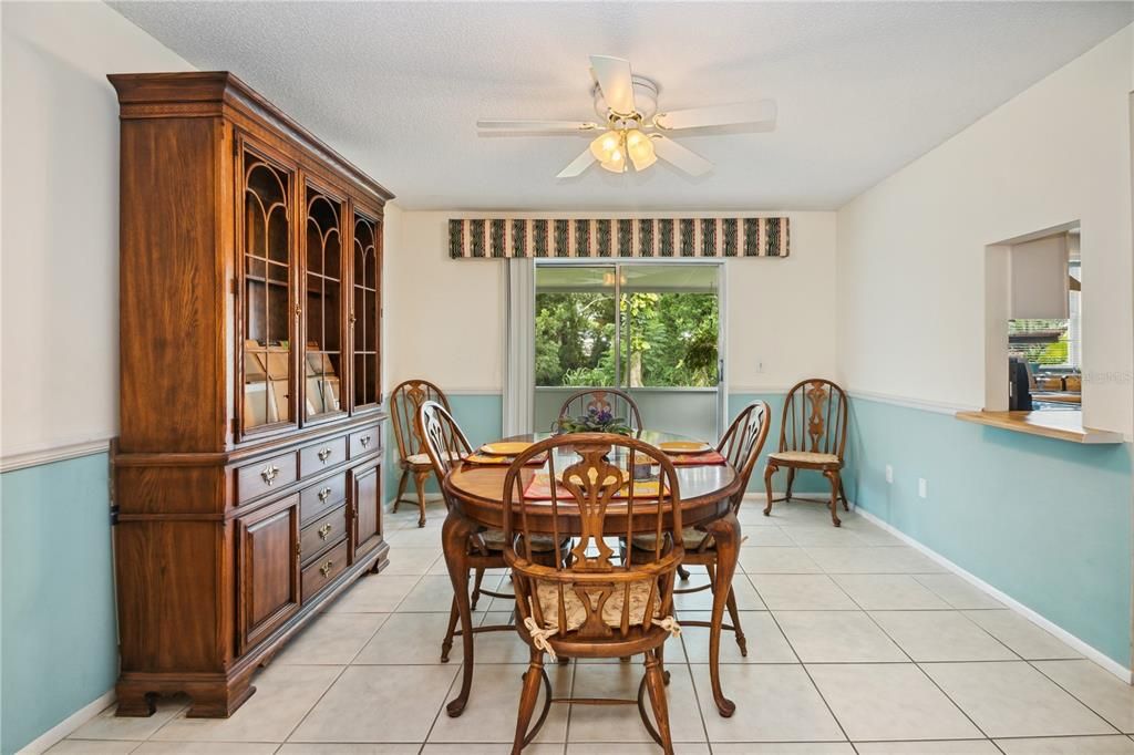 Dining room with sliders to patio